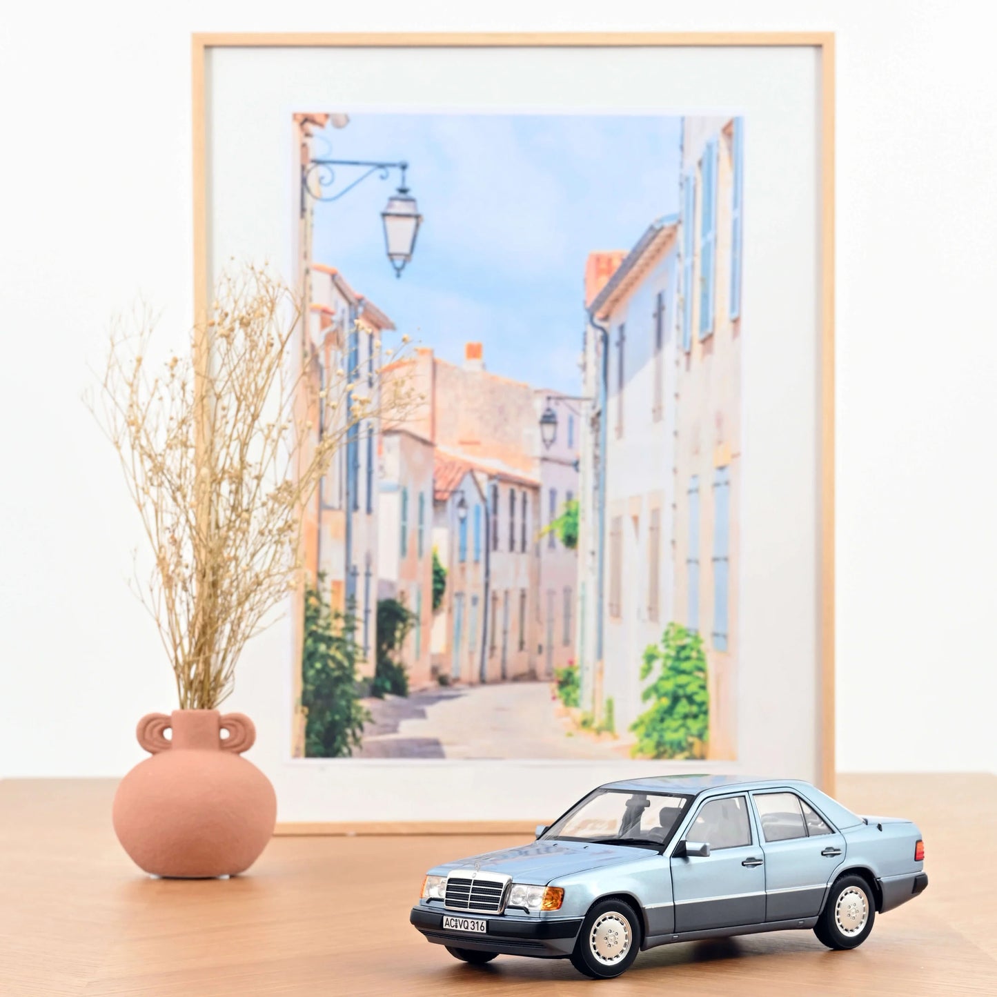 Mercedes-Benz 230 E – 1990 – Light Blue Metallic – 1:18 – Norev