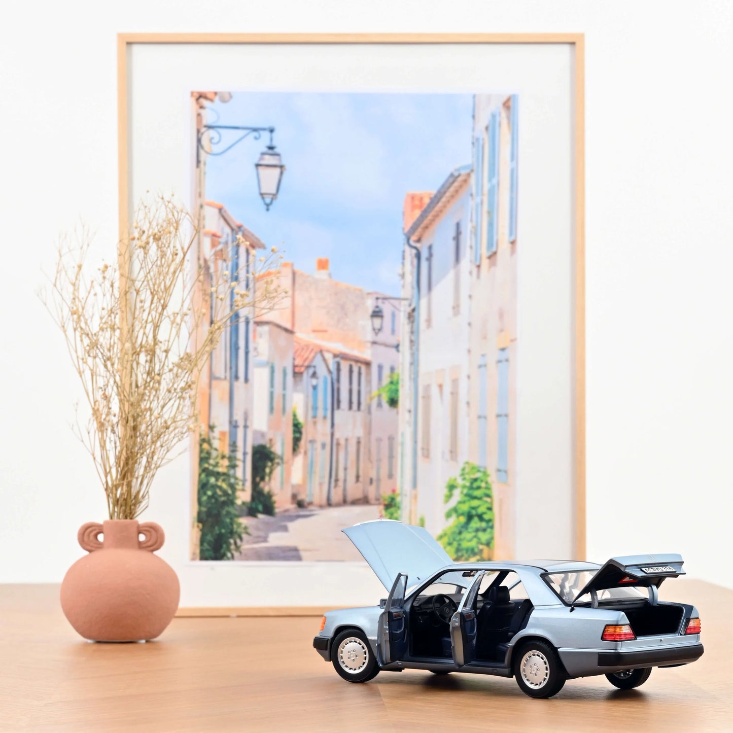 Mercedes-Benz 230 E – 1990 – Light Blue Metallic – 1:18 – Norev