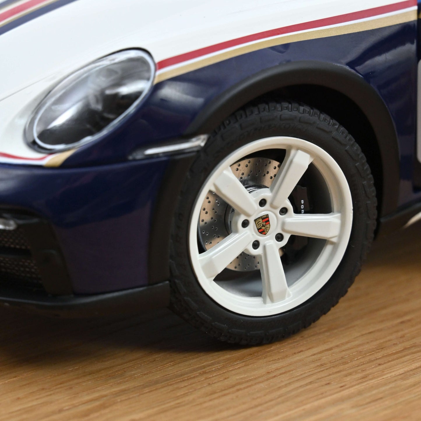 Porsche 911 Dakar 2023 “Roughroads” – #953 – Norev