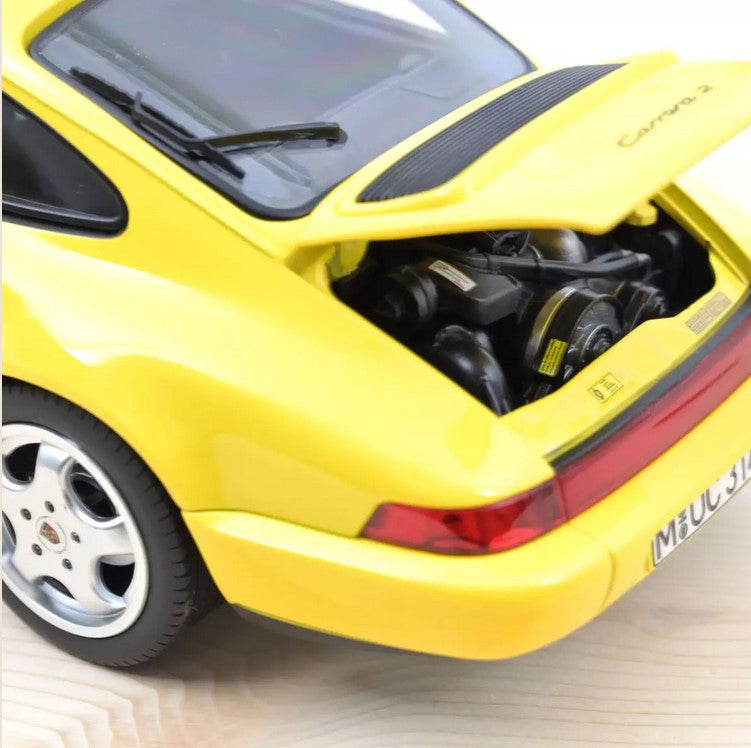 Porsche 911 Carrera 2 (964) 1992 – Yellow – Norev