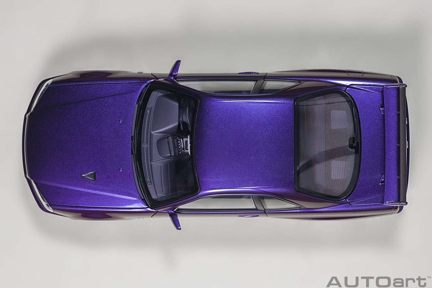 Nissan Skyline GT‑R (R34) V‑Spec II – Midnight Purple III – Autoart