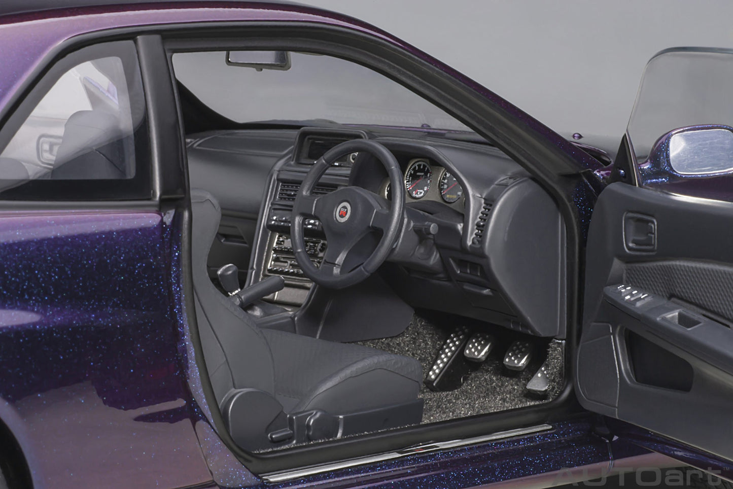 Nissan Skyline GT‑R (R34) V‑Spec II – Midnight Purple III – Autoart