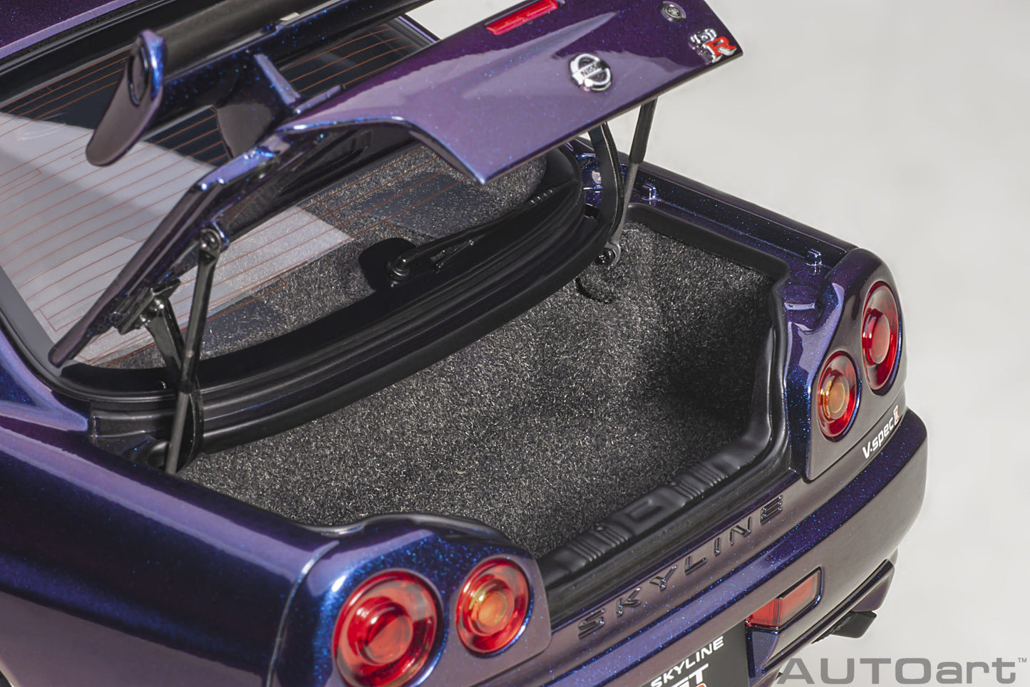 Nissan Skyline GT‑R (R34) V‑Spec II – Midnight Purple III – Autoart