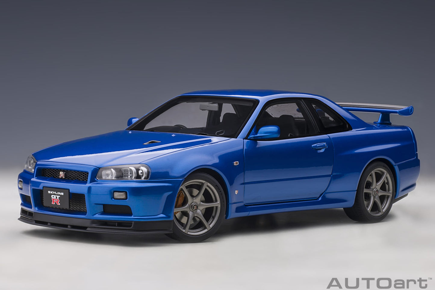 Nissan Skyline GT‑R (R34) V‑Spec II – Bayside Blue – AUTOart