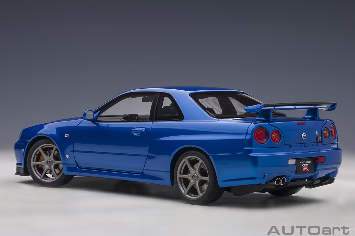 Nissan Skyline GT‑R (R34) V‑Spec II – Bayside Blue – AUTOart