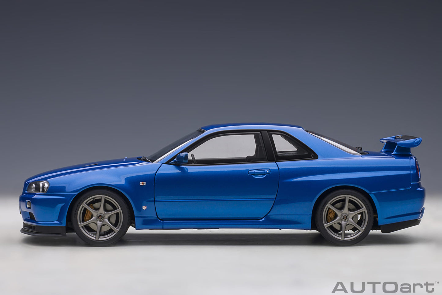 Nissan Skyline GT‑R (R34) V‑Spec II – Bayside Blue – AUTOart