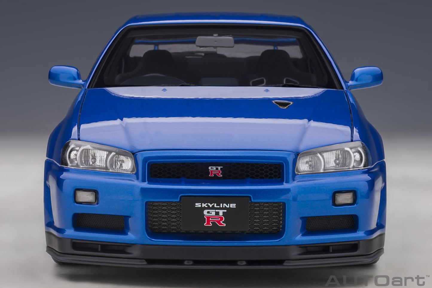 Nissan Skyline GT‑R (R34) V‑Spec II – Bayside Blue – AUTOart