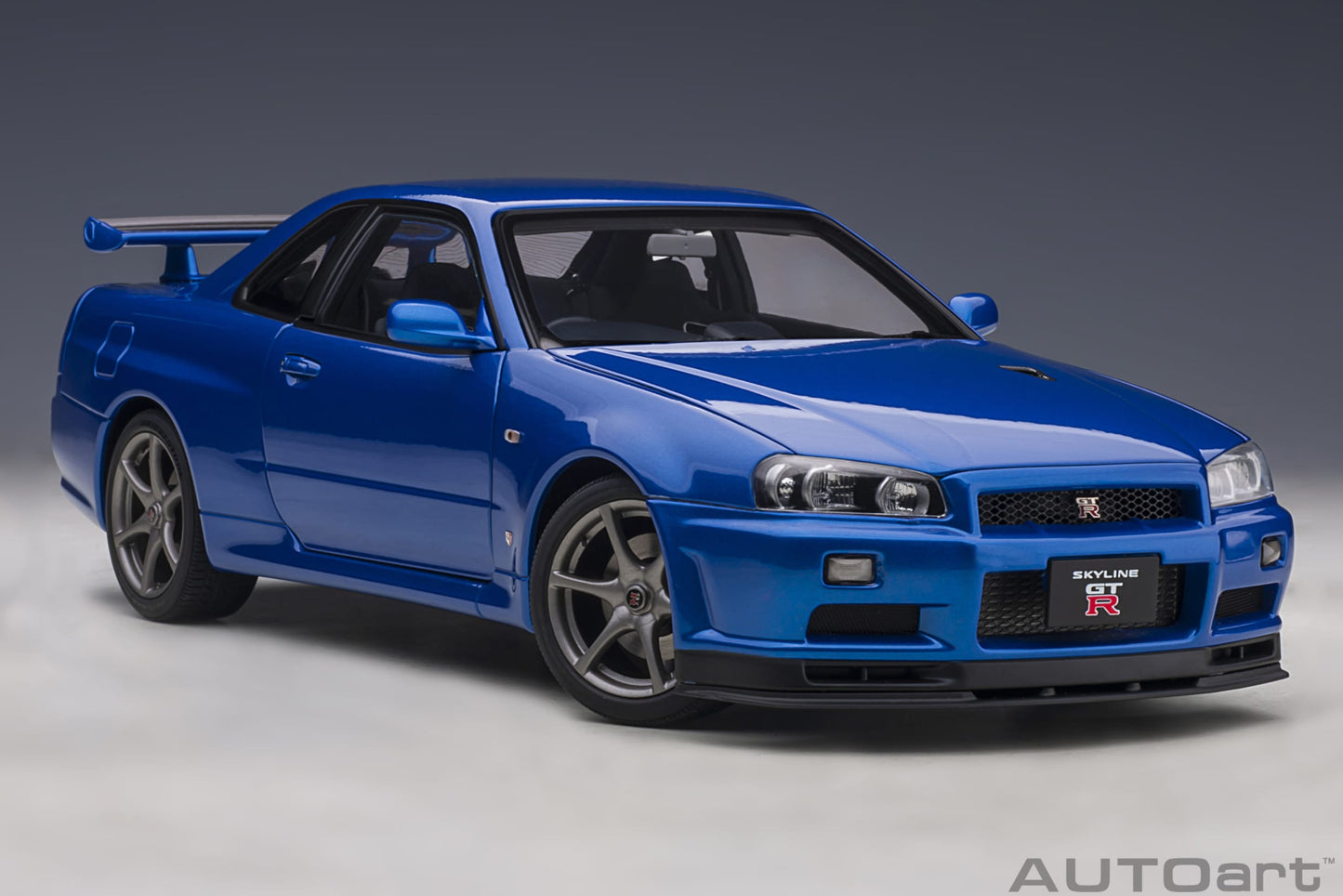 Nissan Skyline GT‑R (R34) V‑Spec II – Bayside Blue – AUTOart