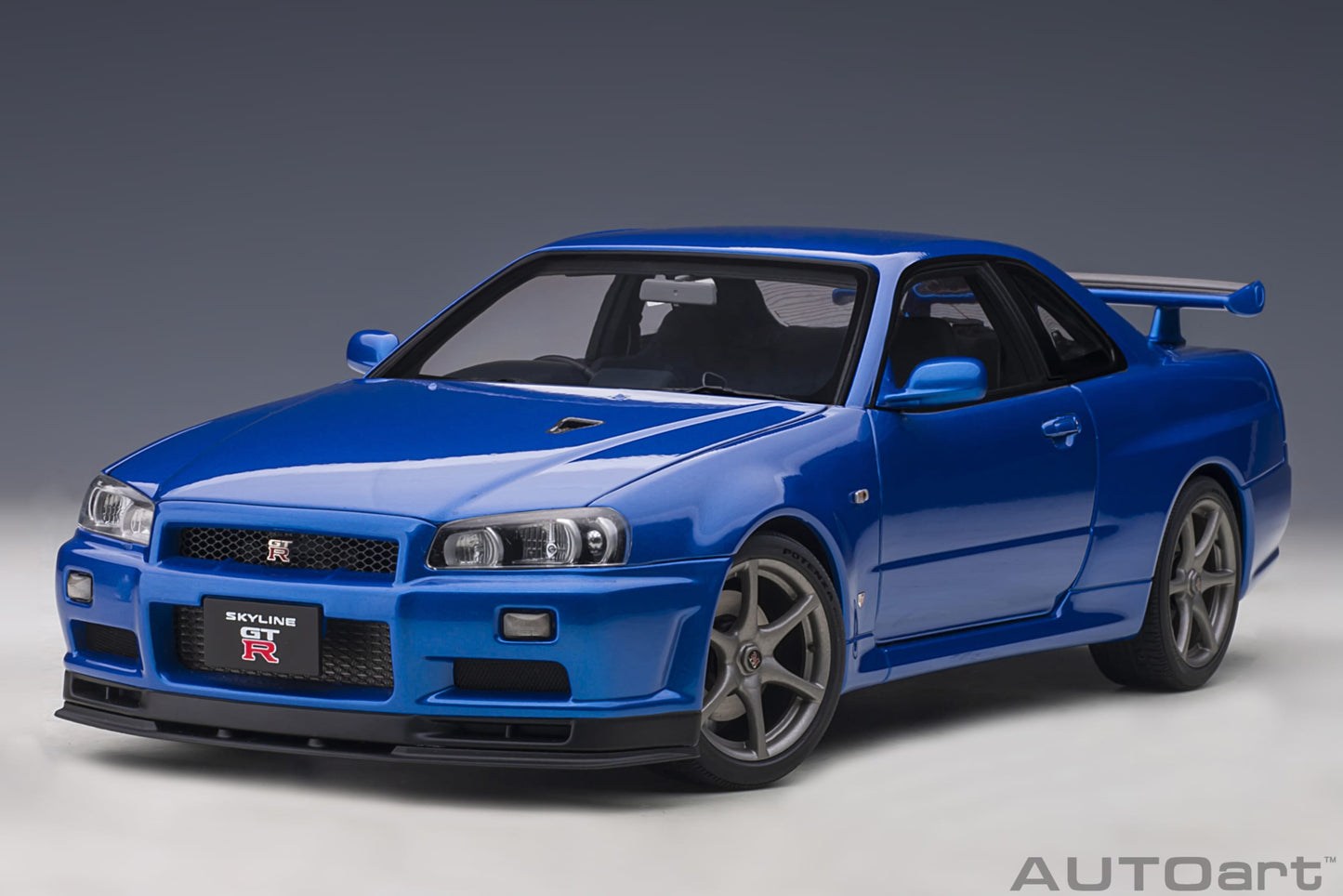 Nissan Skyline GT‑R (R34) V‑Spec II – Bayside Blue – AUTOart