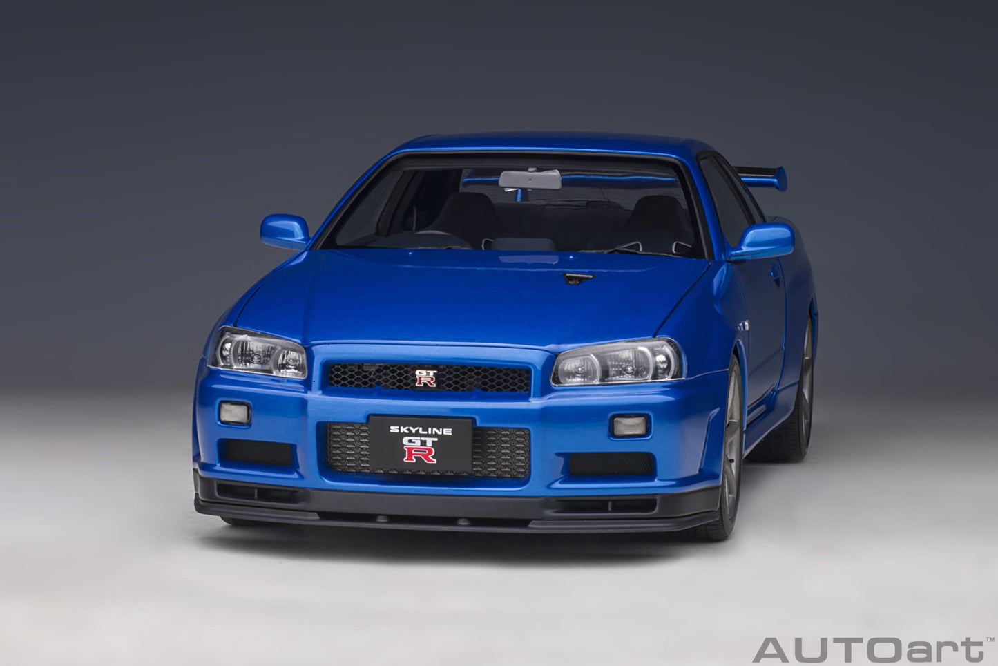 Nissan Skyline GT‑R (R34) V‑Spec II – Bayside Blue – AUTOart
