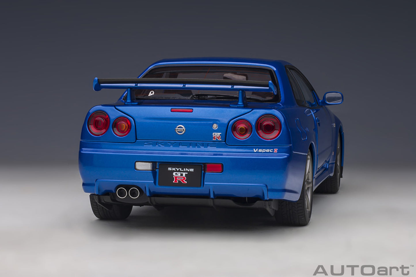 Nissan Skyline GT‑R (R34) V‑Spec II – Bayside Blue – AUTOart