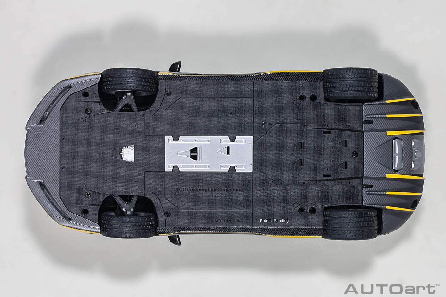 Lamborghini Centenario – 2017 – Carbon (Clear Carbon with Yellow Accents) – 1:18 – AUTOart