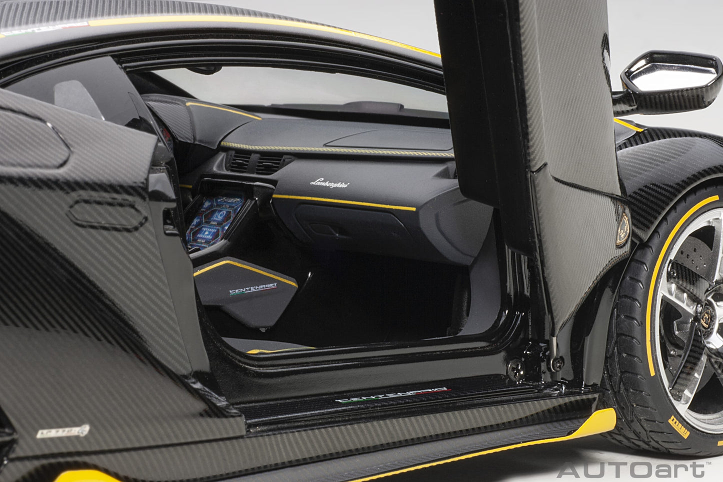 Lamborghini Centenario – 2017 – Carbon (Clear Carbon with Yellow Accents) – 1:18 – AUTOart