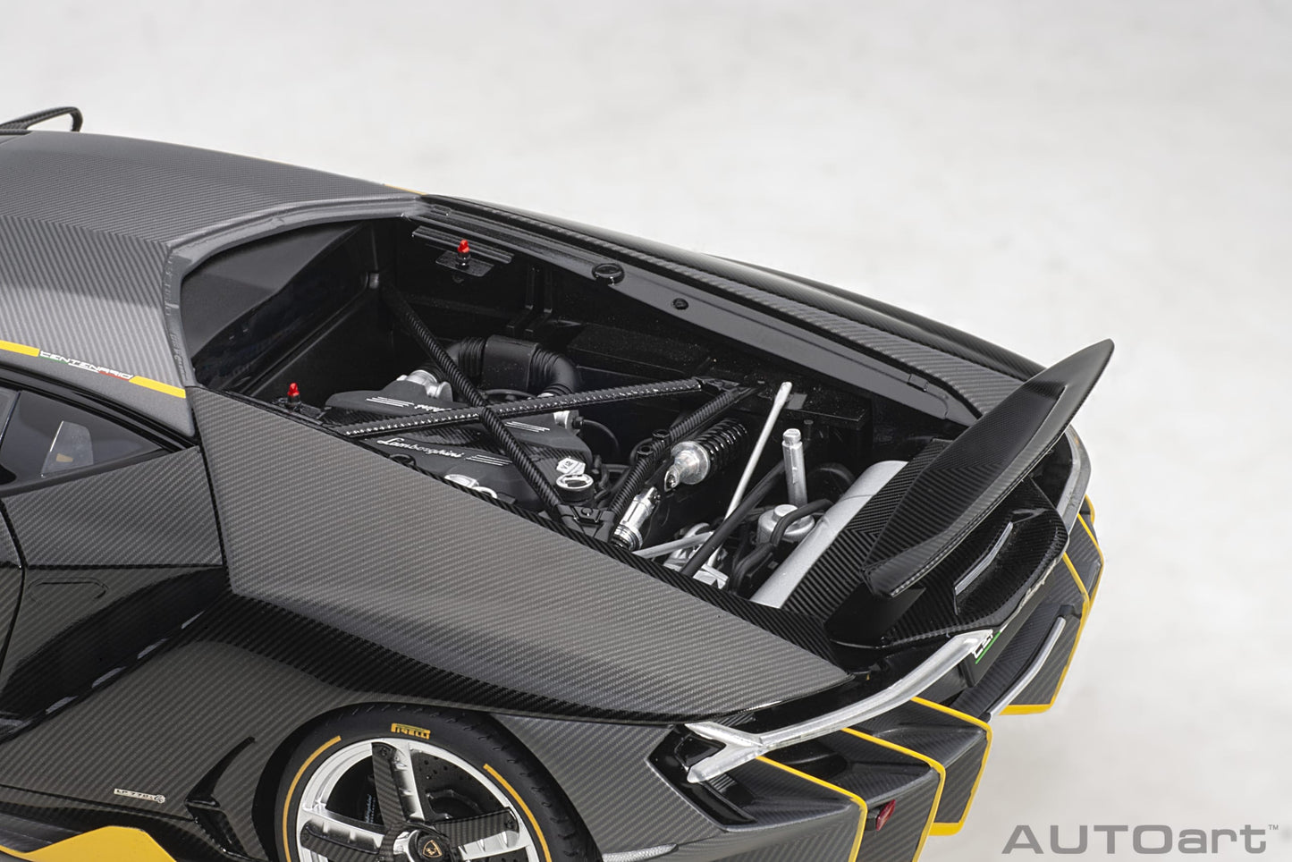 Lamborghini Centenario – 2017 – Carbon (Clear Carbon with Yellow Accents) – 1:18 – AUTOart