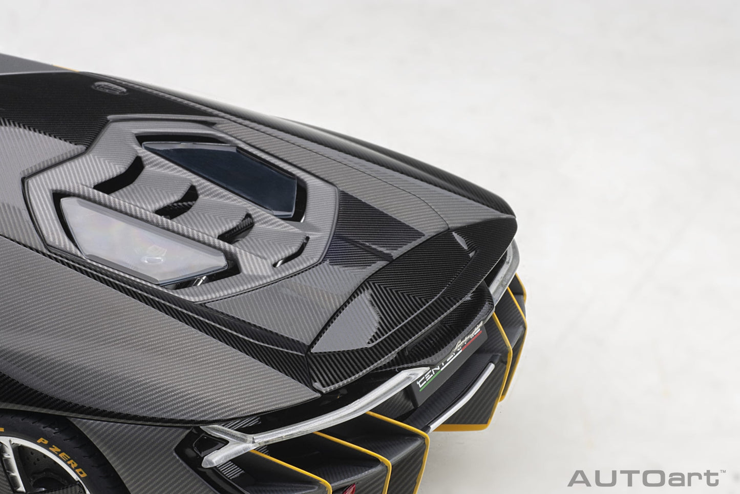 Lamborghini Centenario – 2017 – Carbon (Clear Carbon with Yellow Accents) – 1:18 – AUTOart