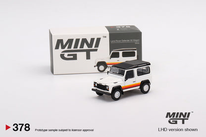Land Rover Defender 90 Wagon – 1:64 – White s prugama i crnim krovom – Mini GT