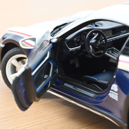 Porsche 911 Dakar 2023 “Roughroads” – #953 – Norev