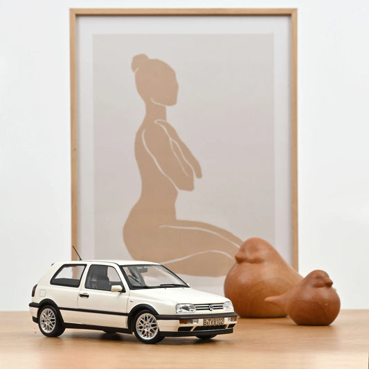 VW Golf GTI 1996 bela 1:18 Norev