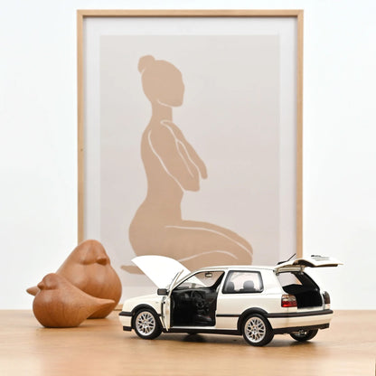 VW Golf GTI 1996 bela 1:18 Norev