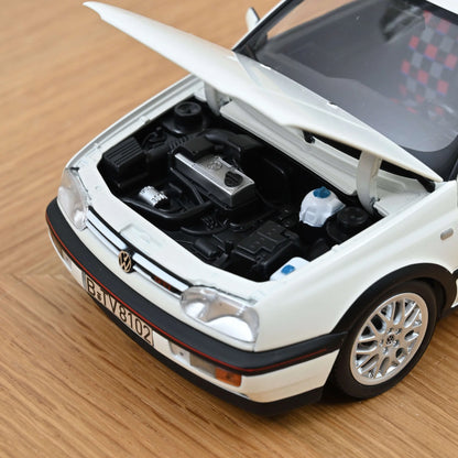 VW Golf GTI 1996 bela 1:18 Norev