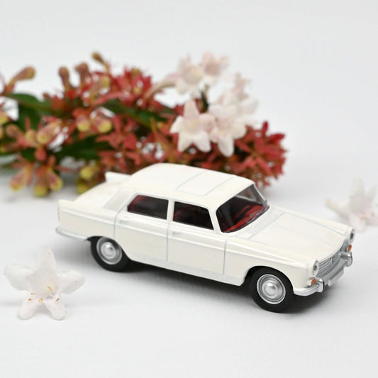 Peugeot 404 1961 Courchevel White – 1:64 Norev