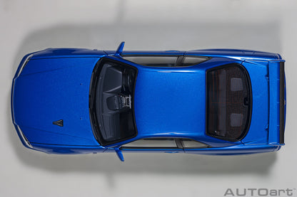 Nissan Skyline GT‑R (R34) V‑Spec II – Bayside Blue – AUTOart