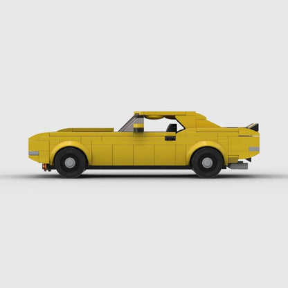 Bočni pogled Chevrolet Camaro Z28 | Daytona Yellow (1969) autića